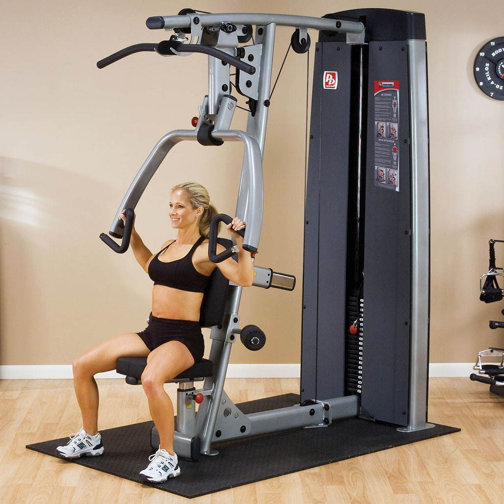 Athlete performing seated chest press on Body-Solid DPLSSF