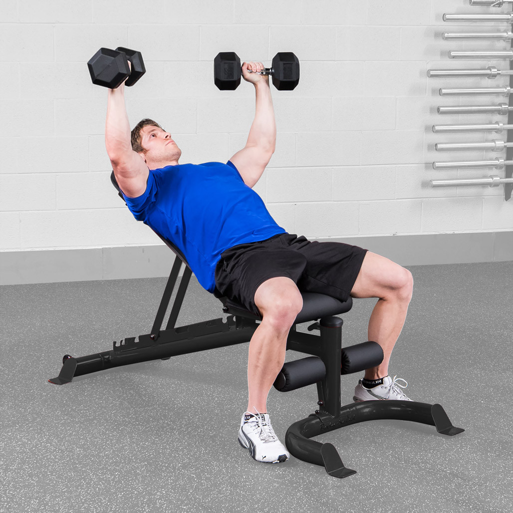 Athlete training on the Body-Solid GFID100B adjustable bench