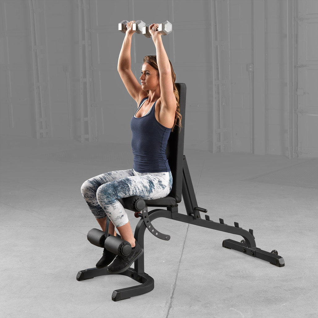 Athlete training on the Body-Solid GFID31B bench