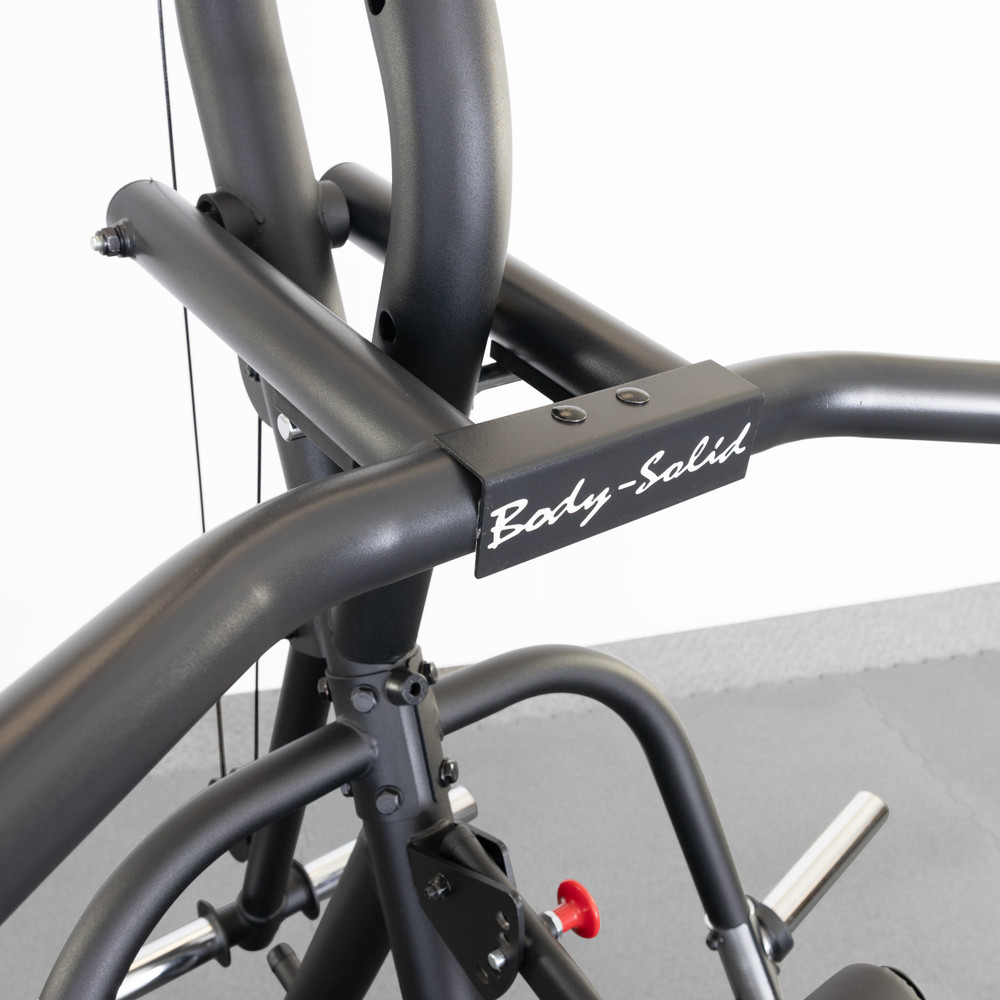 Body-Solid GLGS100B Corner Leverage Gym press arm and Body-Solid badge detail