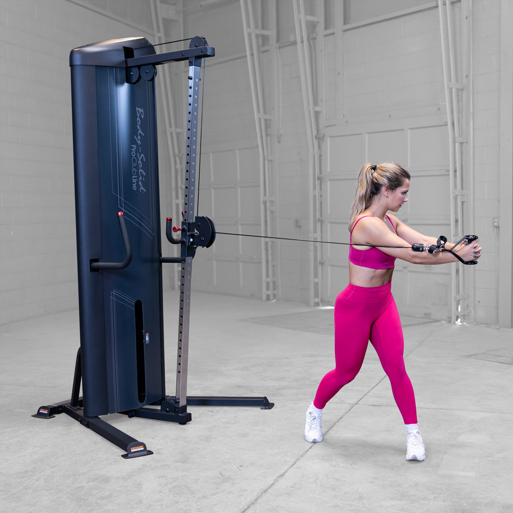 User performing a standing cable press on the Body-Solid S2CC