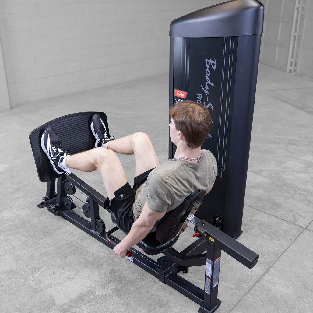 User in the start position of the Body-Solid S2LPC leg press