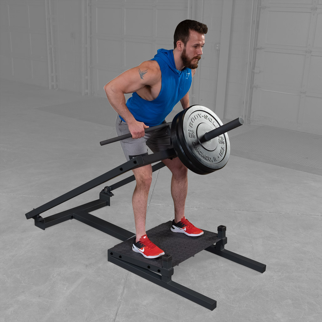 User in the start position of the Body-Solid STBR500 T-bar row