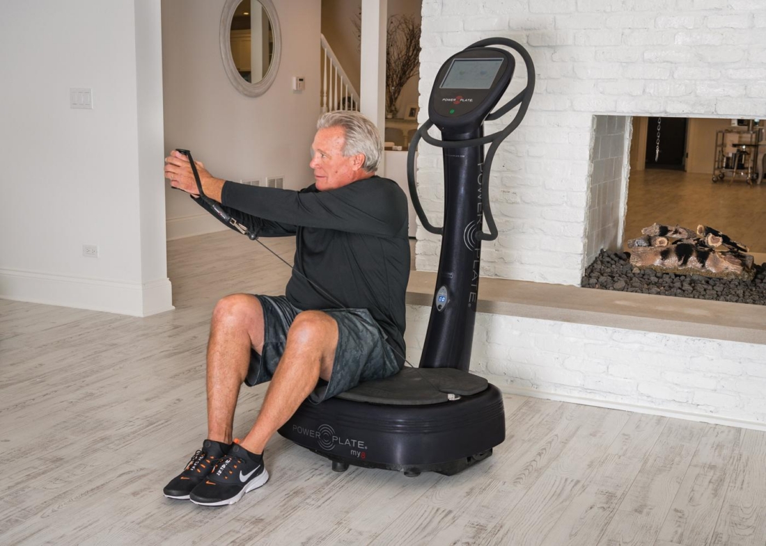 Man performing seated cable exercise on Power Plate my8