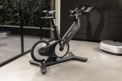 Power Plate REV indoor cycle in matte black, side view