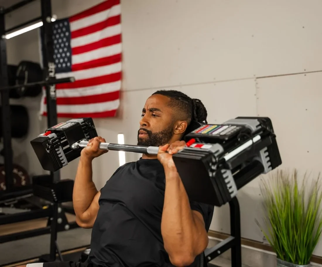 PowerBlock Elite USA Straight Bar loaded with Elite USA dumbbells