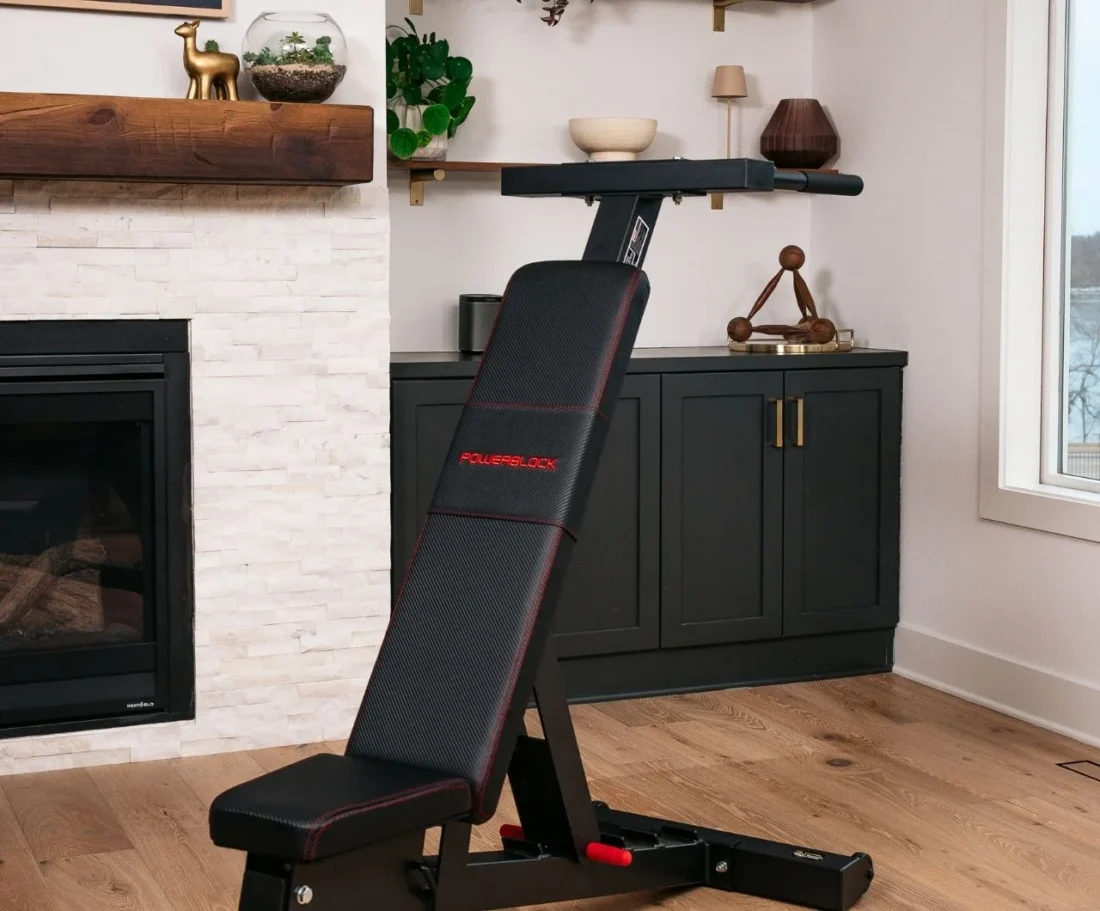 PowerBench 2.0 dip attachment set up in a home gym
