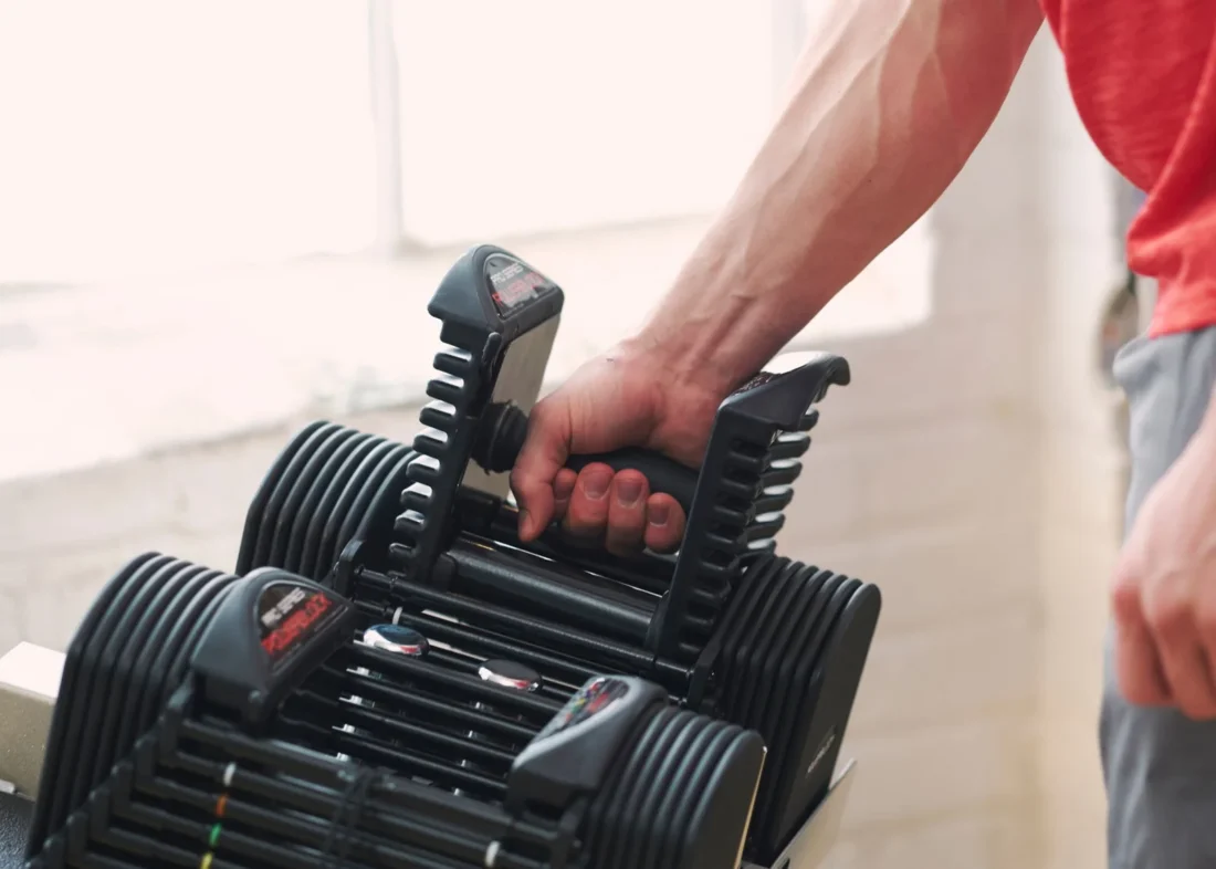 Contoured TPR handle of the PowerBlock Pro 50 adjustable dumbbell