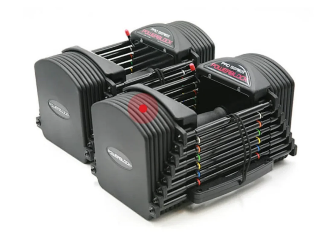 Close-up of the urethane-coated steel weight plates on a PowerBlock Pro 50 dumbbell