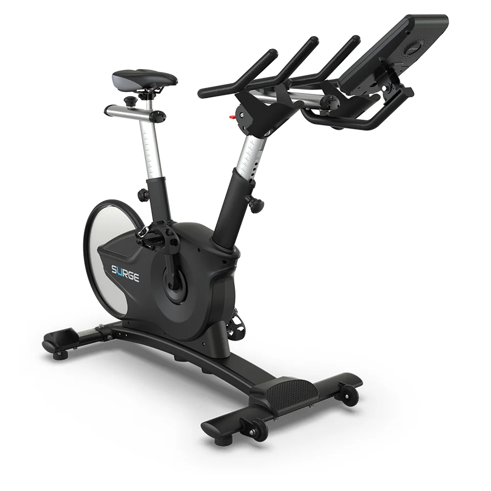 TRUE Surge indoor cycle front three-quarter view with multi-position handlebars