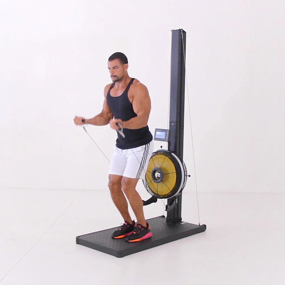 Athlete performing a low cable row on the Renegade Raptor Functional Trainer with the fan in the low position