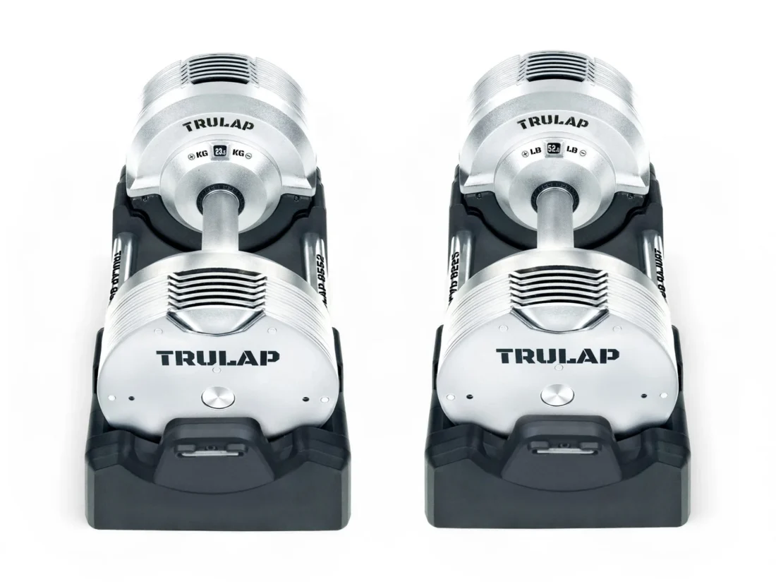 Trulap 8552 G4 adjustable dumbbell pair seated in their docking bases, front view showing the Trulap logo plates