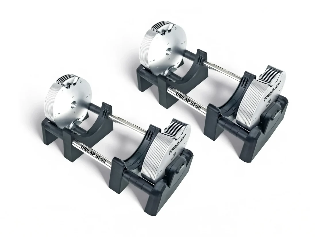 Upgraded Trulap dumbbells with the expansion kit from a three-quarter angle on the longer docking bases